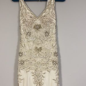 Women’s long of white never worn sequins dress